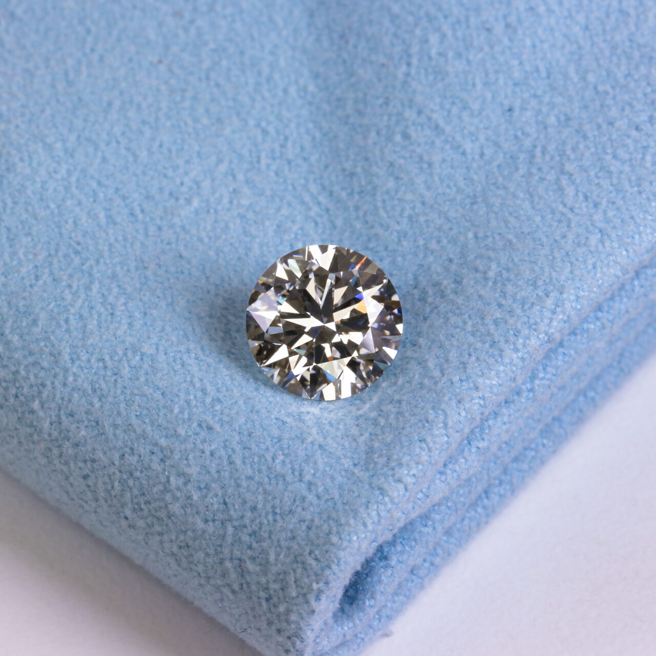 3 Carat Round Brilliant Lab Grown Diamond on Polishing Cloth